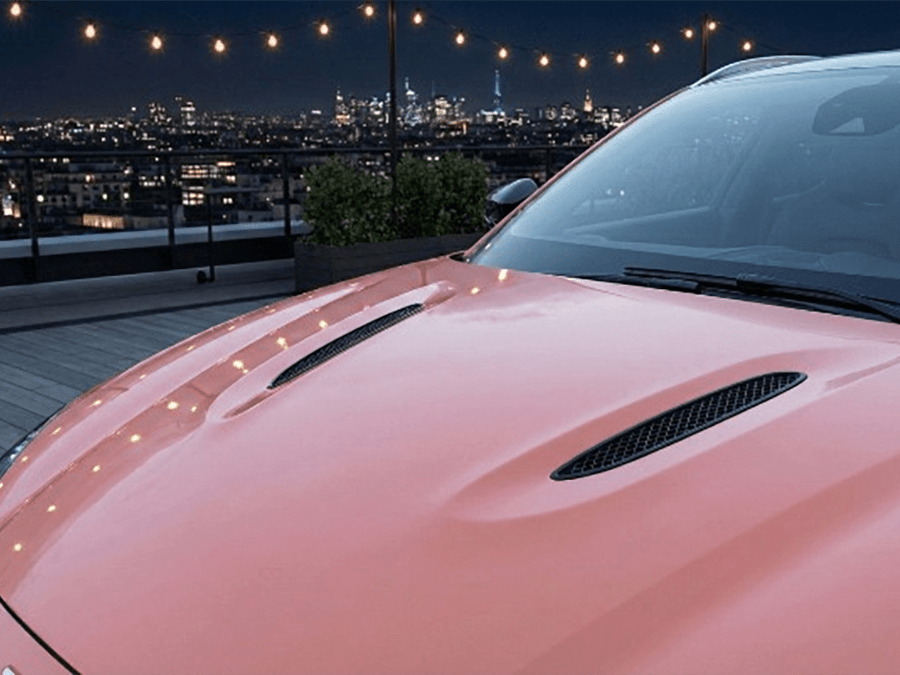 DIY Aston Martin Vantage wrapped in Super Gloss HXONE™ Phoenix Ocher vinyl wrap HXONE301