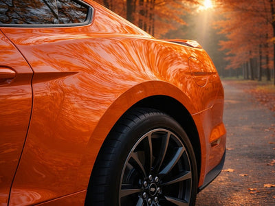 Ford Mustang wrapped in SuperGloss HXONE™ Sunrise Orange car wrap film HXONE302