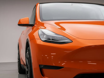 DIY Tesla Y wrapped in SuperGloss HXONE™ Sunrise Orange wrap film HXONE302
