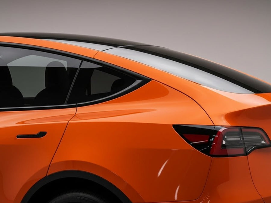 Tesla Y wrapped in Hexis Super Gloss HXONE™ Sunrise Orange automotive vinyl film HXONE302