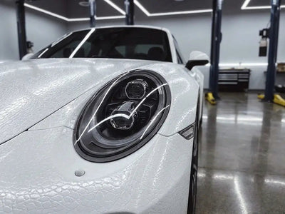 Porsche 911 wrapped in None HX30000 Glacier White Alligator Leather automotive vinyl film HX30AL003B