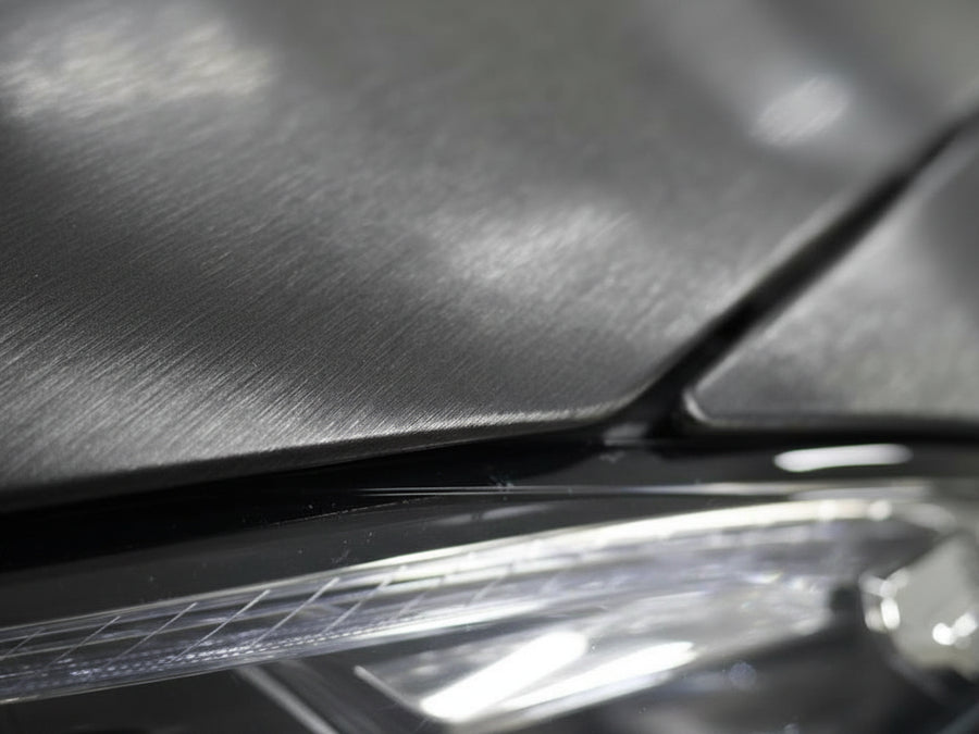 Car wrapped in Hexis Brushed HX30000 Anthracite Gray Aluminum car wrap film HX30BAGANB