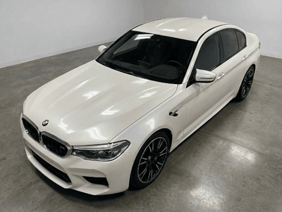 BMW M5 wrapped in Gloss HX30000 Nacre White restyling film HX30BNCB