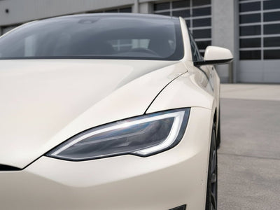 Tesla S wrapped in Gloss HX30000 Nacre White restyling film HX30BNCB
