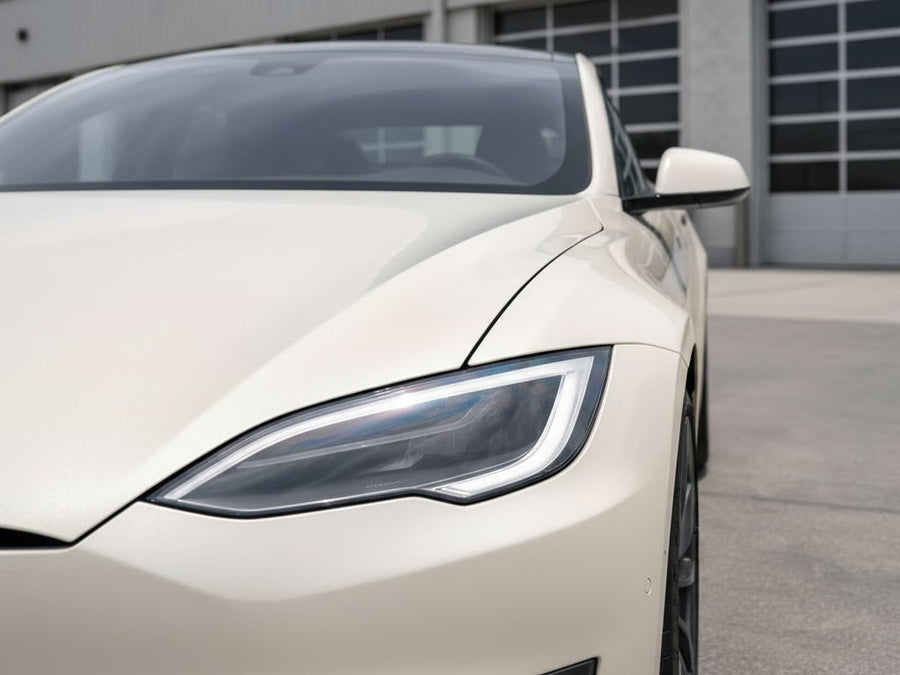 Tesla S wrapped in Gloss HX30000 Nacre White restyling film HX30BNCB