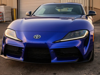 Toyota Supra wrapped in Gloss HX30000 Neon Blue wrap film HX30BNEB