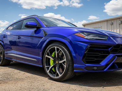 Lamborghini Urus wrapped in Hexis Gloss HX30000 Neon Blue wrap film HX30BNEB