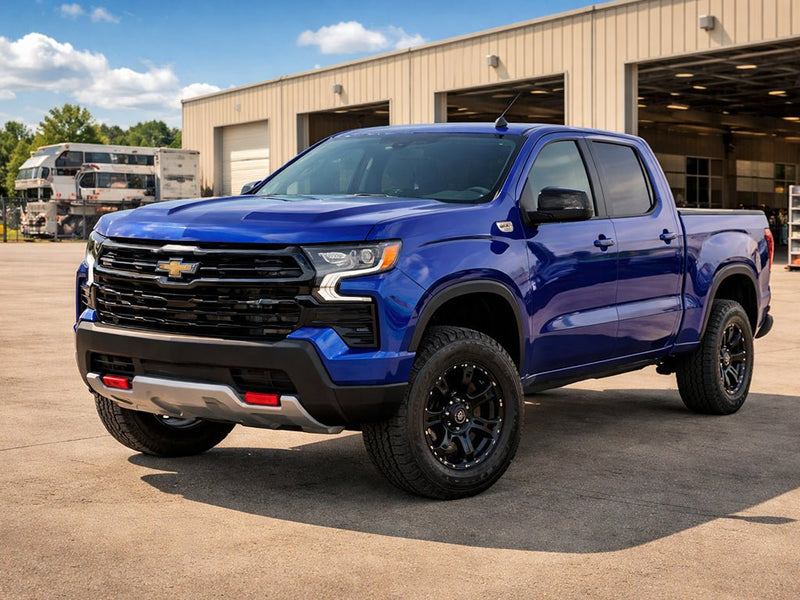 DIY Chevrolet Silverado wrapped in Gloss HX30000 Neon Blue wrap film HX30BNEB