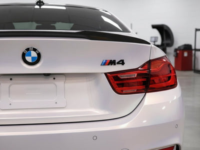 BMW M4 wrapped in Hexis Gloss HX30000 Pearl White Variochrome vinyl wrap HX30BPEB