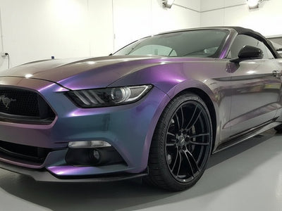 Ford Mustang wrapped in Hexis Gloss HX30000 Black Carbon Fiber automotive vinyl film HX30CA890B