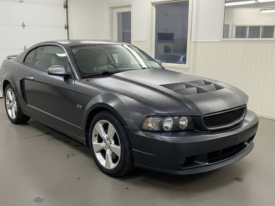 Ford Mustang GT wrapped in Gloss HX30000 Black Carbon Fiber automotive vinyl film HX30CA890B