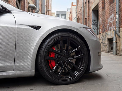 Tesla S wrapped in Gloss HX30000 Graphite Gray Carbon Fiber car wrap film HX30CAGGRB