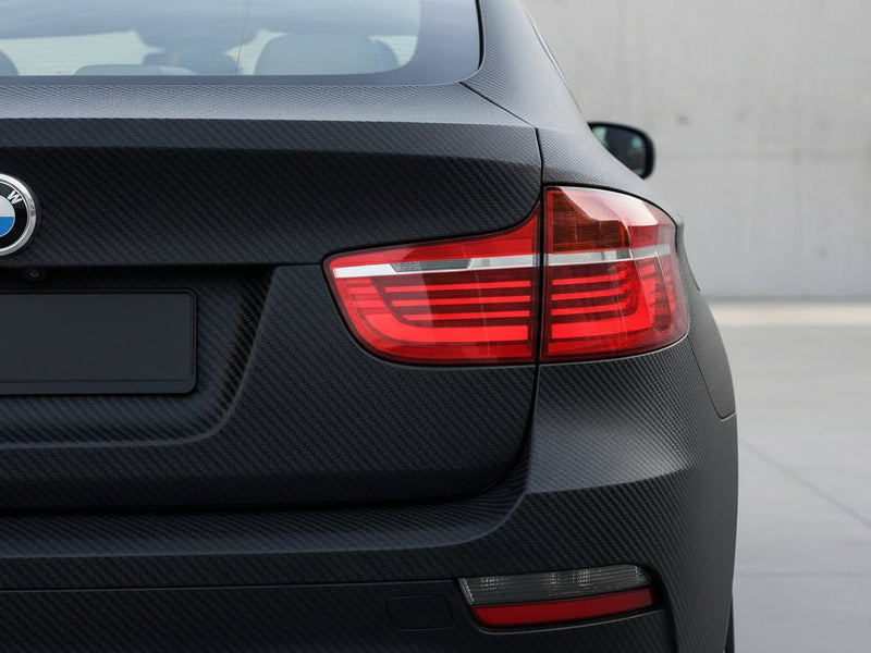 BMW 3 Series wrapped in Matte HX30000 Raven Black Carbon Fiber automotive vinyl film HX30CANCOB