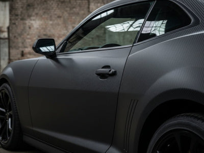 Chevrolet Camaro wrapped in Hexis Matte HX30000 Raven Black Carbon Fiber wrap film HX30CANCOB