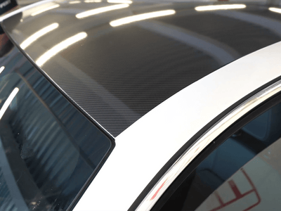 Car wrapped in Hexis Gloss HX30000 Black Carbon One Carbon Fiber wrap film HX30CANPEB