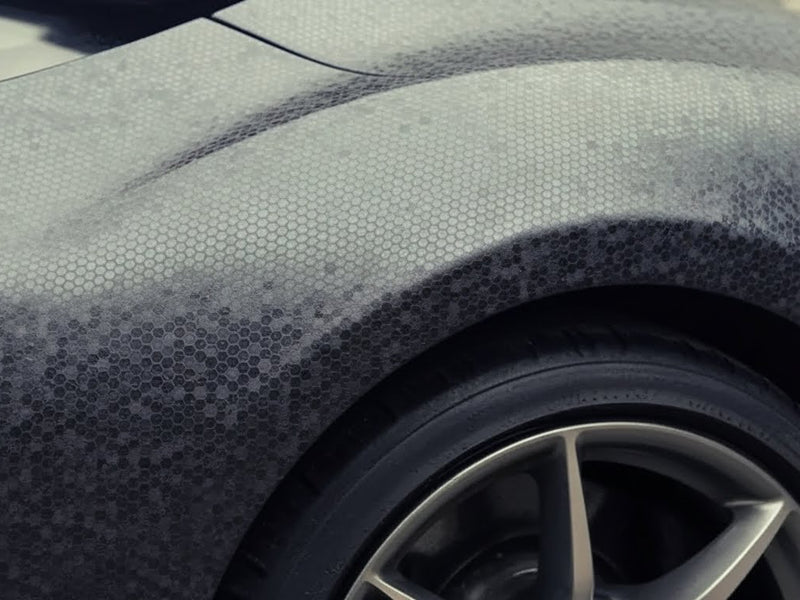 Car wrapped in None HX30000 Black Honeycomb automotive vinyl film HX30CAF89S