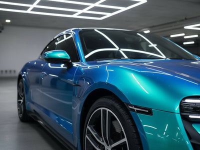 Porsche Taycan wrapped in Gloss HX30000 Iridescent Austral Sea car wrap film HX30IMAB