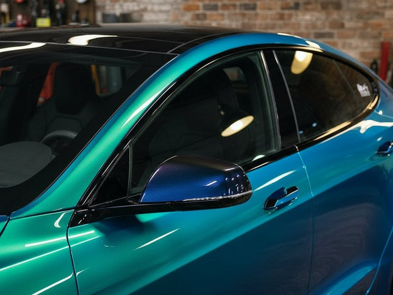 Car wrapped in Hexis Gloss HX30000 Iridescent Austral Sea vinyl wrap HX30IMAB