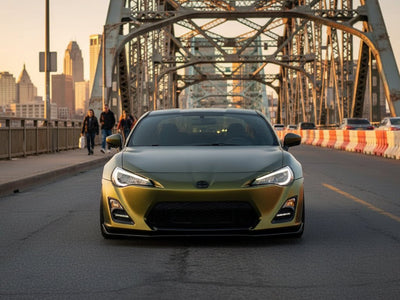Scion FR-S wrapped in Matte HX30000 Golden Black restyling film HX30N71M