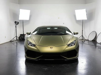Lamborghini Huracán wrapped in Matte HX30000 Golden Black wrap film HX30N71M