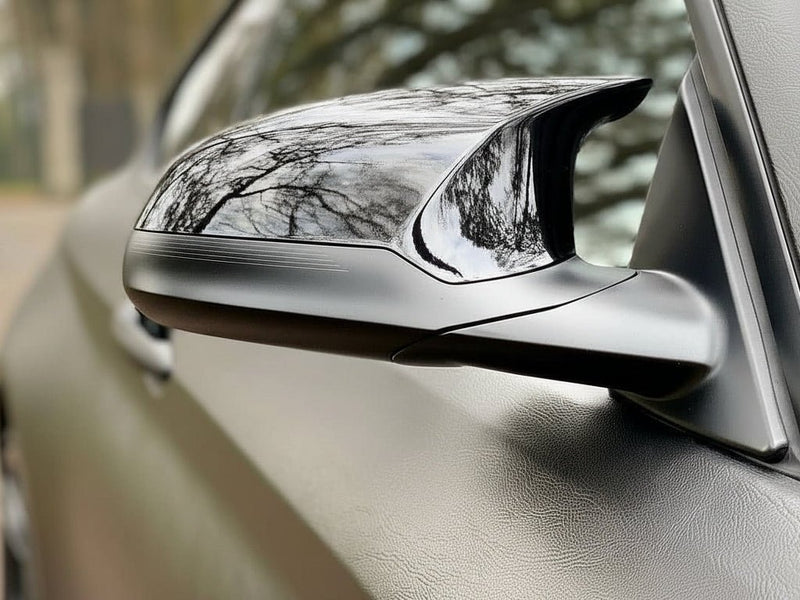 Car wrapped in None HX30000 Black Fine Grain Leather wrap film HX30PG889B