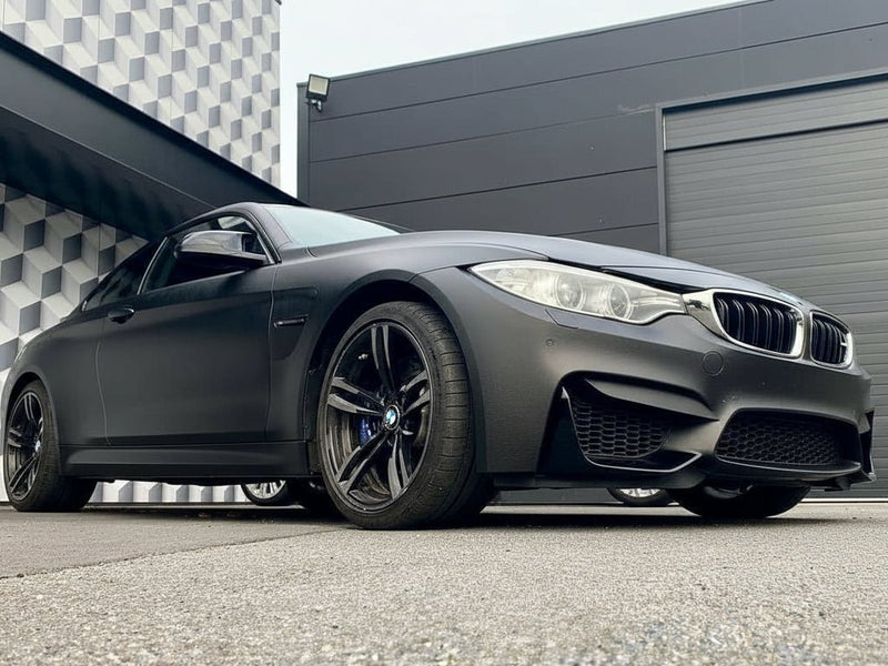 BMW M4 wrapped in Hexis None HX30000 Black Fine Grain Leather vinyl wrap HX30PG889B