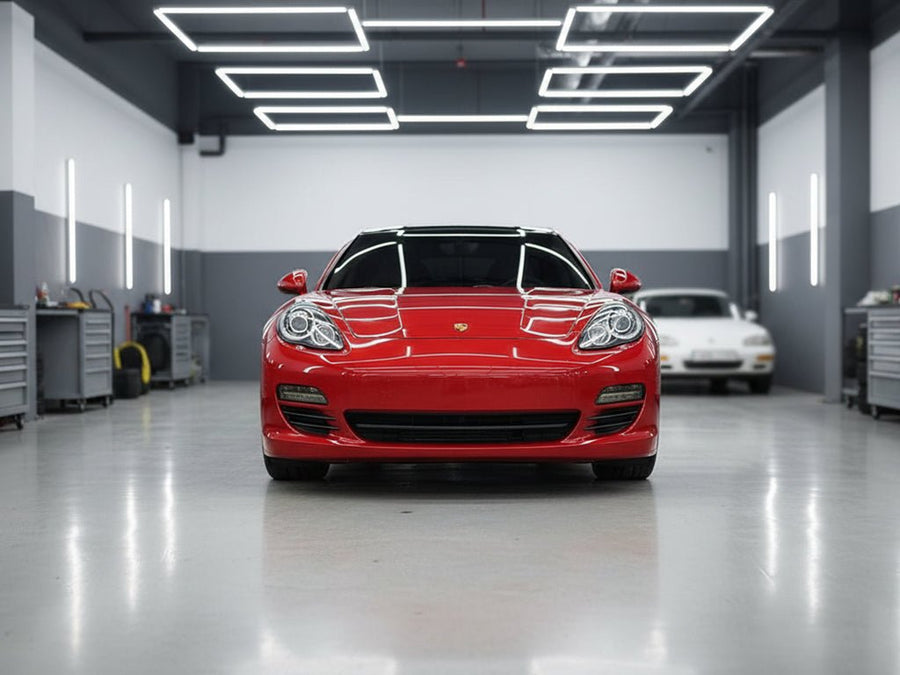 Porsche Panamera wrapped in Gloss HX30000 Redcurrent Red restyling film HX30RGOB