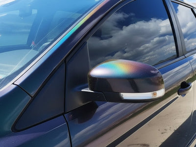 Car wrapped in Gloss HX30000 Black Rainbow automotive vinyl film HX30RW889B