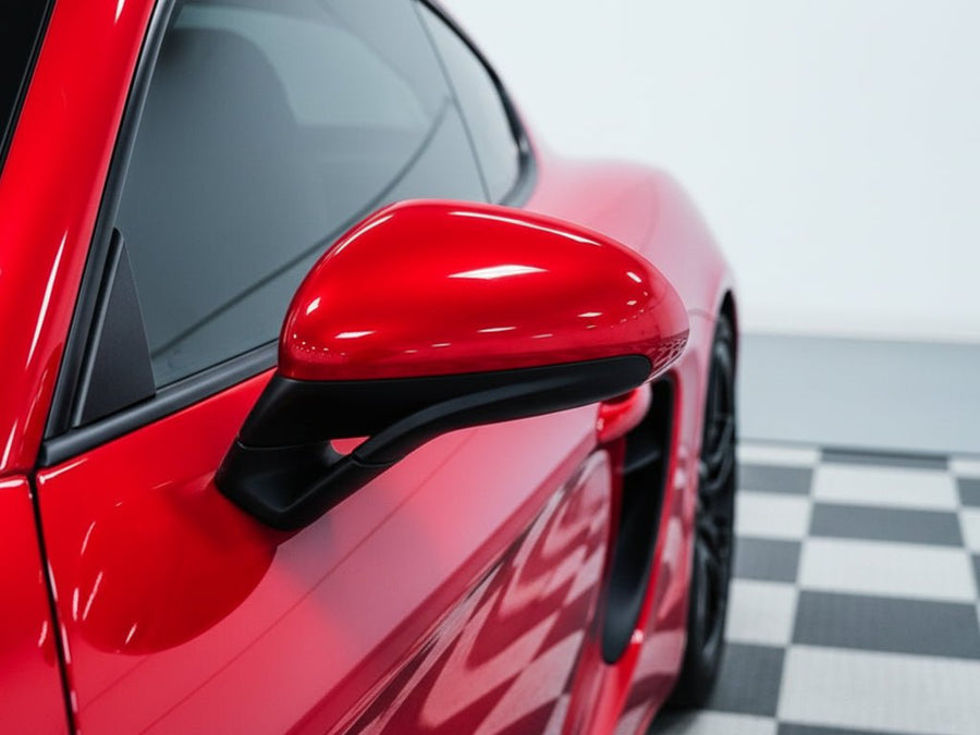 Porsche Cayman wrapped in Gloss HX30000 Super Chrome Red vinyl wrap HX30SCH02B