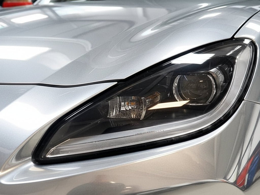Porsche Panamera wrapped in Gloss HX30000 Super Chrome Titanium car wrap film HX30SCH03B