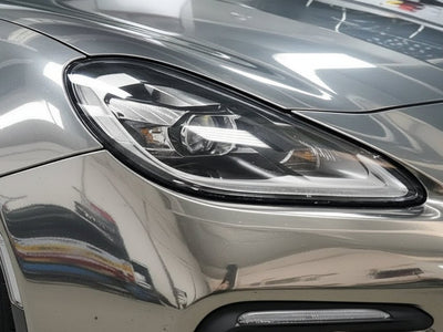 Porsche Panamera wrapped in Hexis Gloss HX30000 Super Chrome Titanium restyling film HX30SCH03B