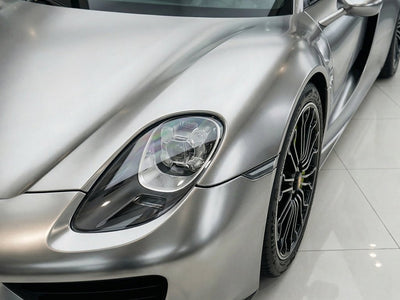 Porsche 918 Spyder wrapped in Hexis Satin HX30000 Super Chrome Titanium restyling film HX30SCH03S