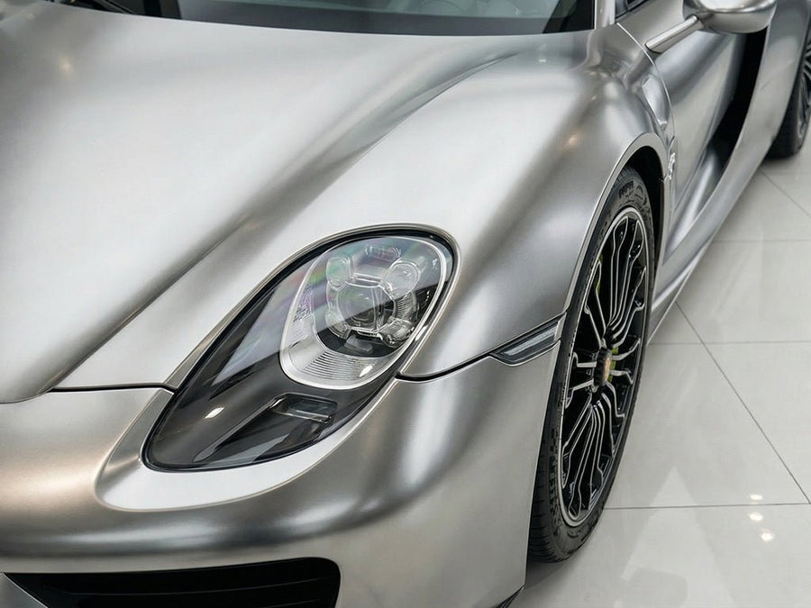 Porsche 918 Spyder wrapped in Hexis Satin HX30000 Super Chrome Titanium restyling film HX30SCH03S