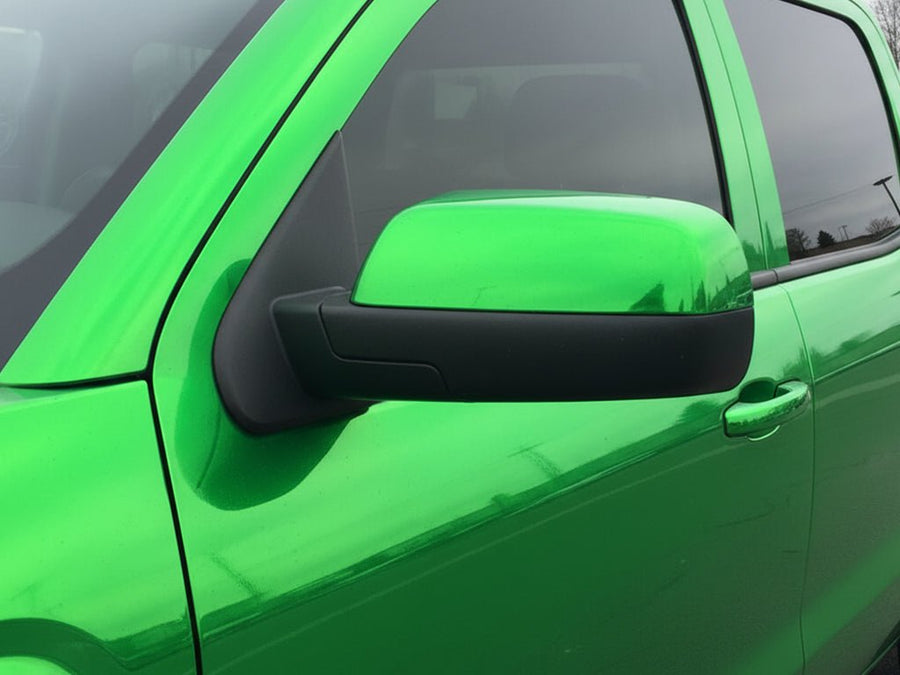 Car wrapped in Gloss HX30000 Super Chrome Green restyling film HX30SCH04B