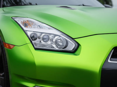 Nissan GT-R wrapped in Satin HX30000 Super Chrome Green restyling film HX30SCH04S