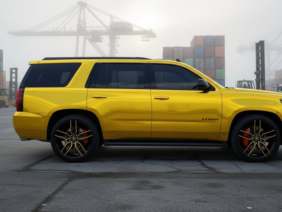 Chevrolet Tahoe wrapped in Gloss HX30000 Super Chrome Gold automotive vinyl film HX30SCH07B