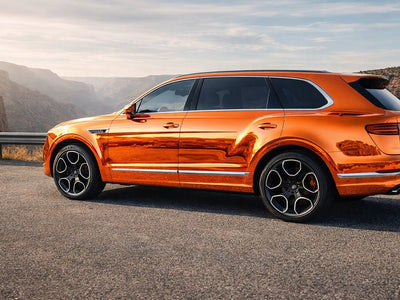 Bentley Bentayga wrapped in Hexis Gloss HX30000 Super Chrome Orange car wrap film HX30SCH08B