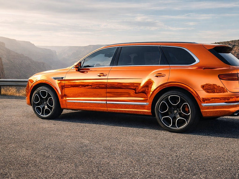 Bentley Bentayga wrapped in Hexis Gloss HX30000 Super Chrome Orange car wrap film HX30SCH08B