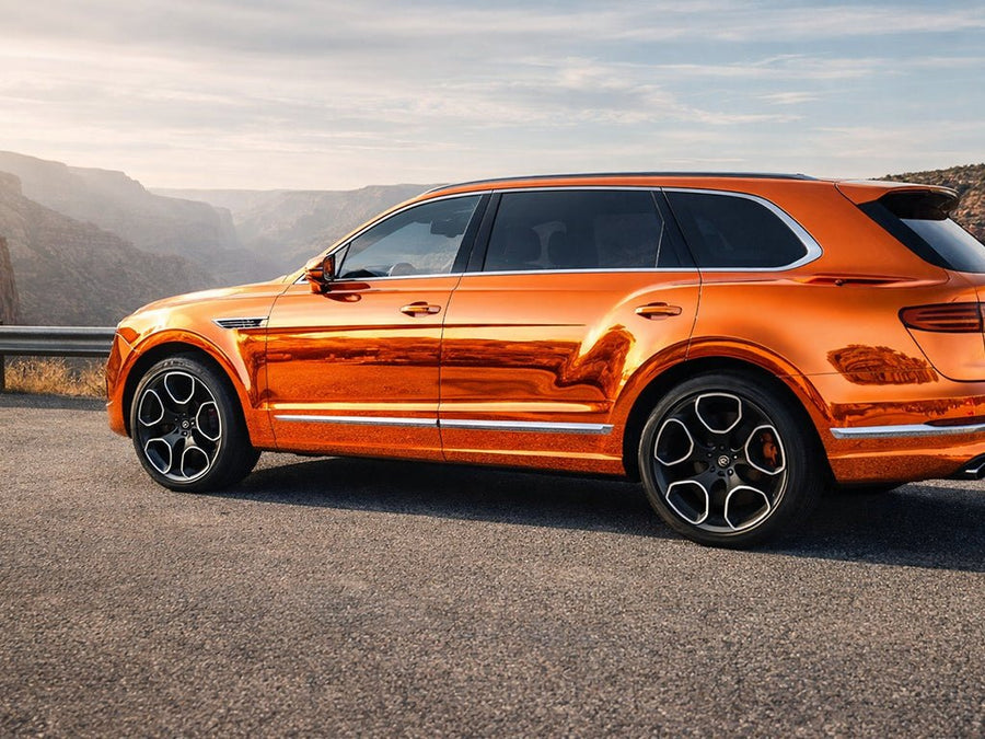 Bentley Bentayga wrapped in Hexis Gloss HX30000 Super Chrome Orange car wrap film HX30SCH08B