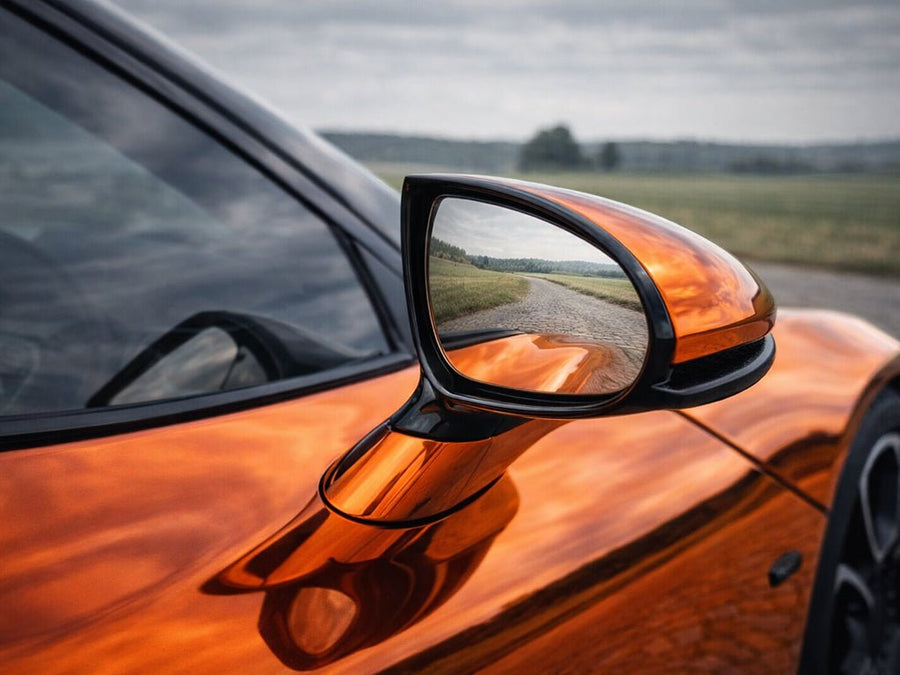 McLaren 720S wrapped in Hexis Gloss HX30000 Super Chrome Orange car wrap film HX30SCH08B