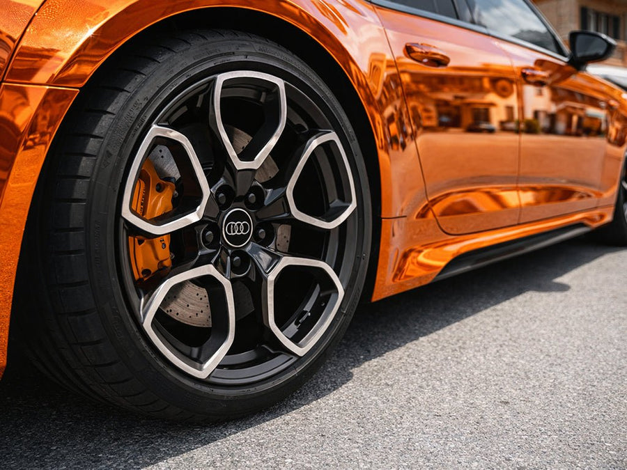 Audi e-tron GT wrapped in Gloss HX30000 Super Chrome Orange automotive vinyl film HX30SCH08B