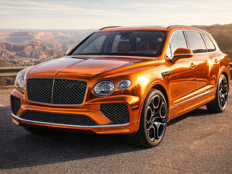 Bentley Bentayga wrapped in Gloss HX30000 Super Chrome Orange automotive vinyl film HX30SCH08B