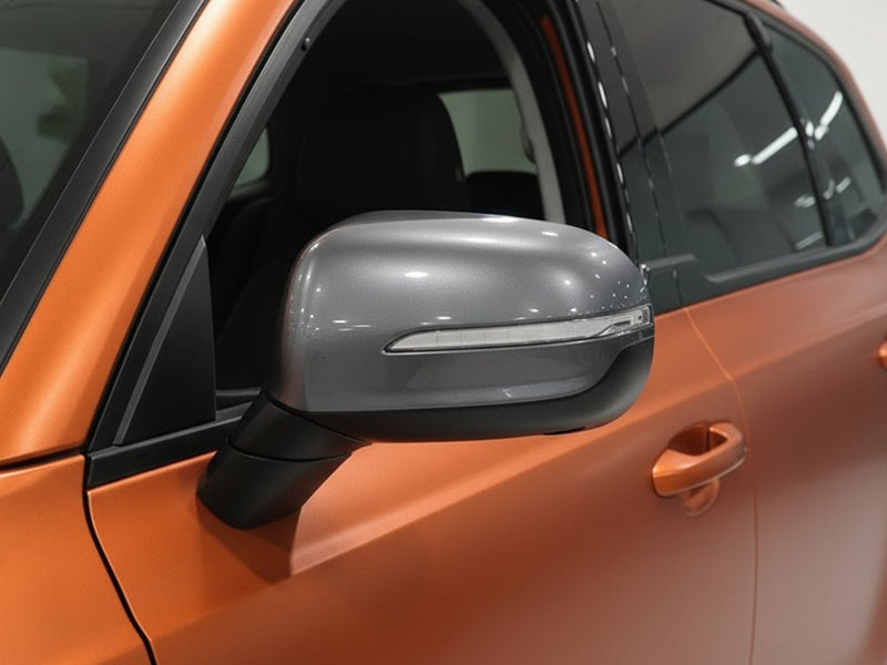 Car wrapped in Hexis Satin HX30000 Super Chrome Orange vinyl wrap HX30SCH08S