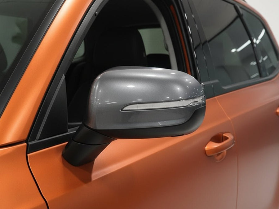 Car wrapped in Hexis Satin HX30000 Super Chrome Orange vinyl wrap HX30SCH08S