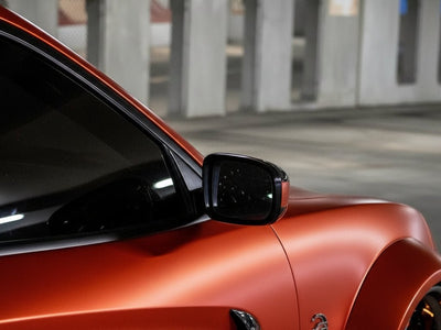 Nissan 350Z wrapped in Satin HX30000 Super Chrome Orange restyling film HX30SCH08S