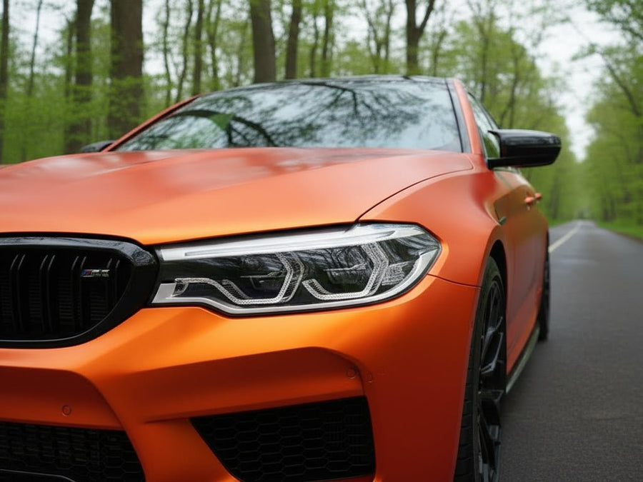 BMW M5 wrapped in Satin HX30000 Super Chrome Orange automotive vinyl film HX30SCH08S