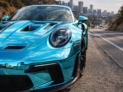Porsche 911 wrapped in Gloss HX30000 Super Chrome Light Blue wrap film HX30SCH11B