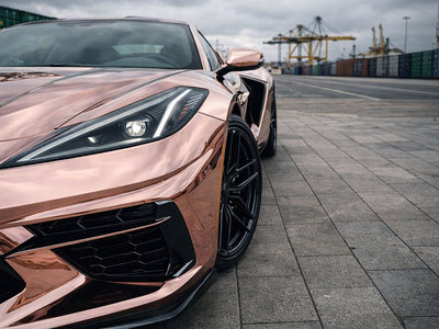 Chevrolet Corvette C8 wrapped in Gloss HX30000 Super Chrome Rose Gold automotive vinyl film HX30SCH12B