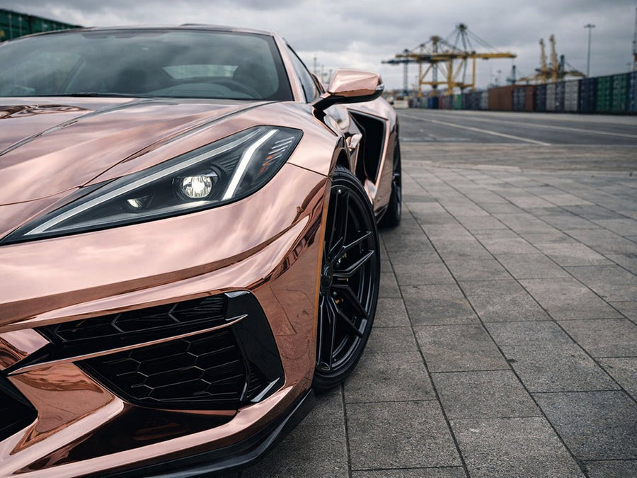 Chevrolet Corvette C8 wrapped in Gloss HX30000 Super Chrome Rose Gold automotive vinyl film HX30SCH12B