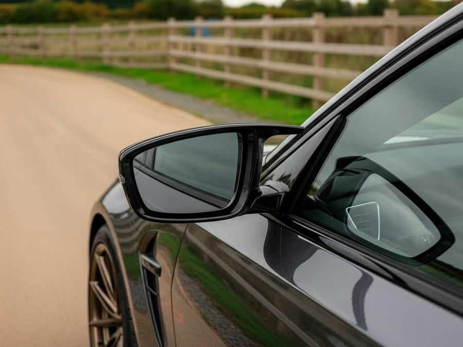 DIY BMW M4 wrapped in Gloss HX30000 Super Chrome Ebony Black automotive vinyl film HX30SCH13B